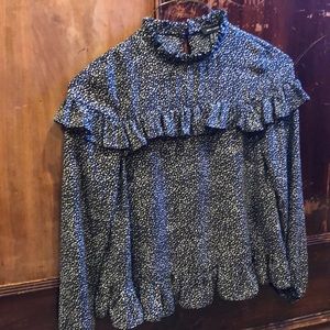 Cute black top.  Great for work or church